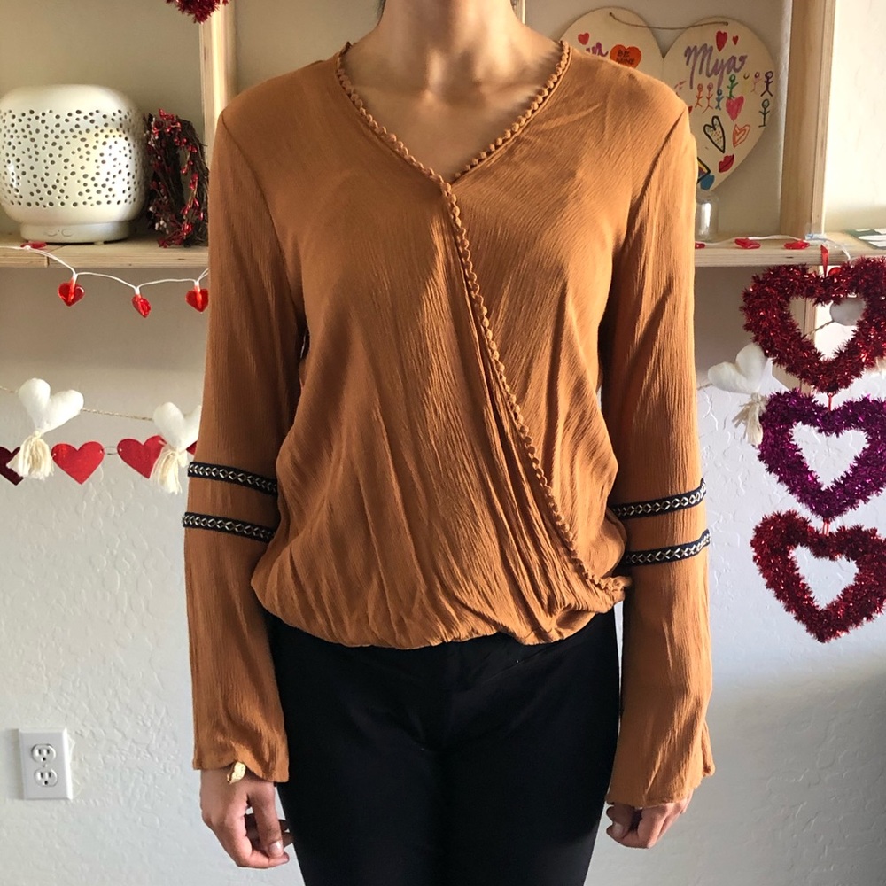 Brown top with flowing sleeves